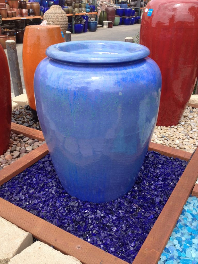 picture of ocean blue exotic landscape glass around a pot