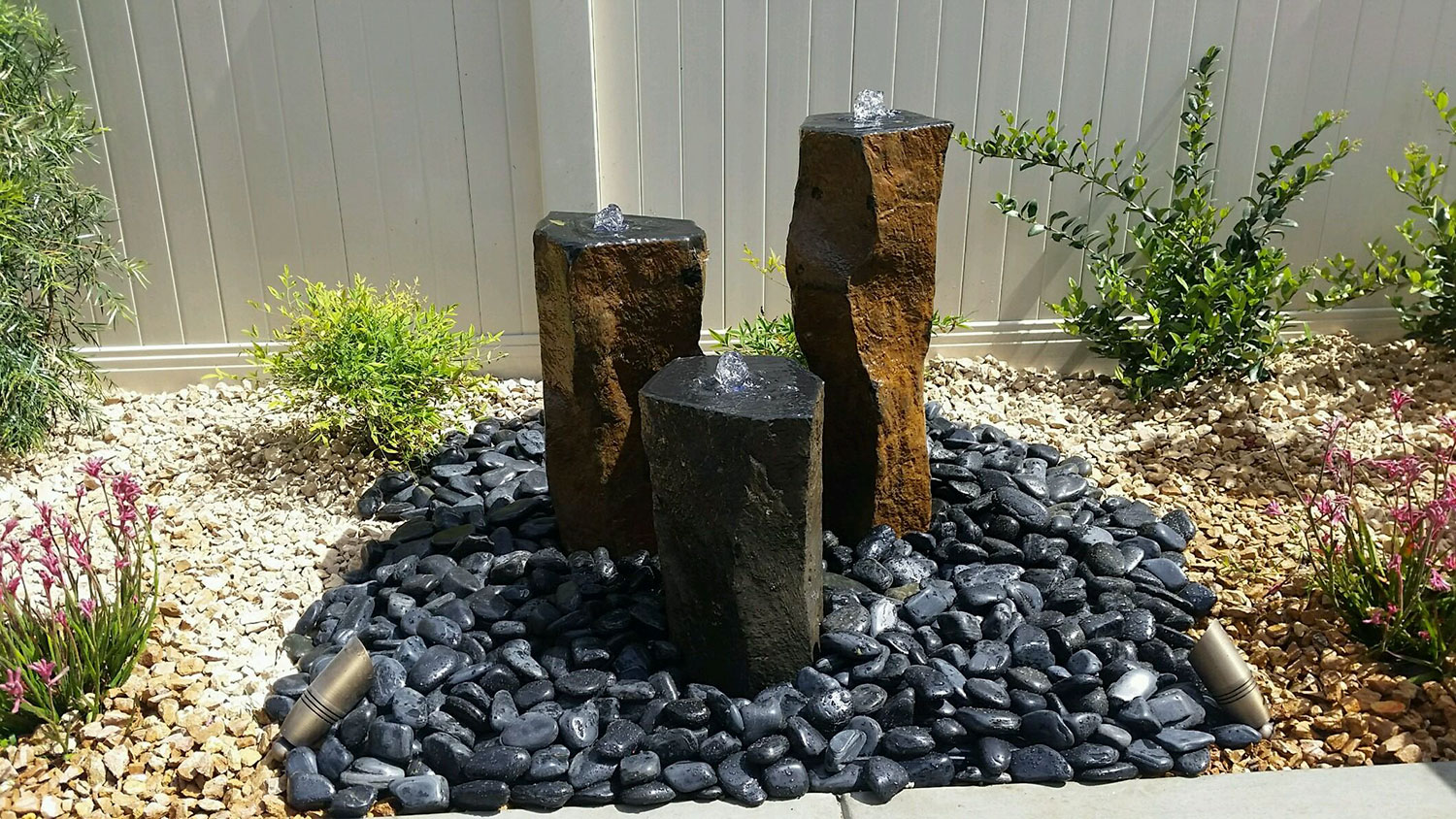 picture of Decorative High Polished Black Pebbles on Basalt Column