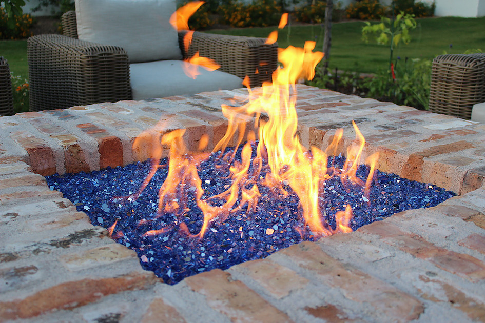 Lava Rock vs Fire Glass - Blog - Fireplace and Chimney Authority