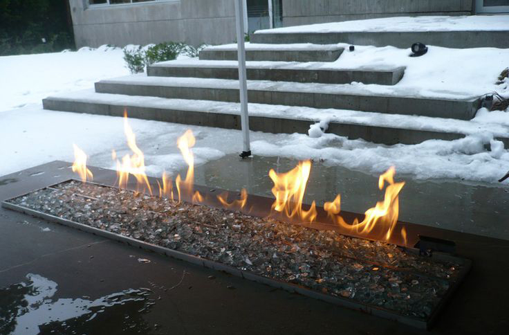 picture of fireglass fire pit in the snow