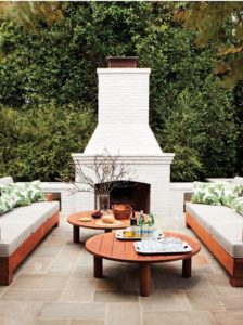 outdoor fireplace white with table