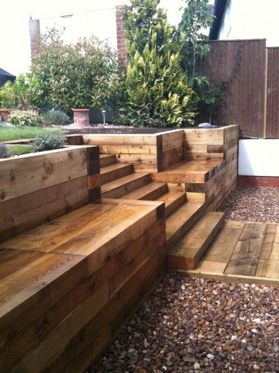 wood stairs leading up to patio