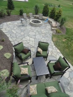 backyard patio designed around fireplace
