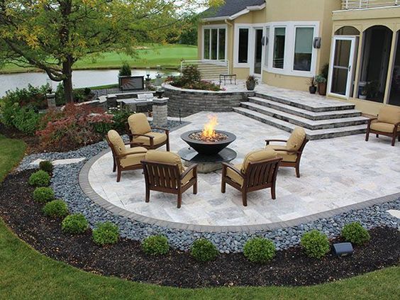 four wood chairs around the patio