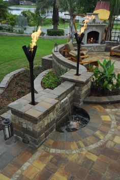 backyard patio with tiki torches