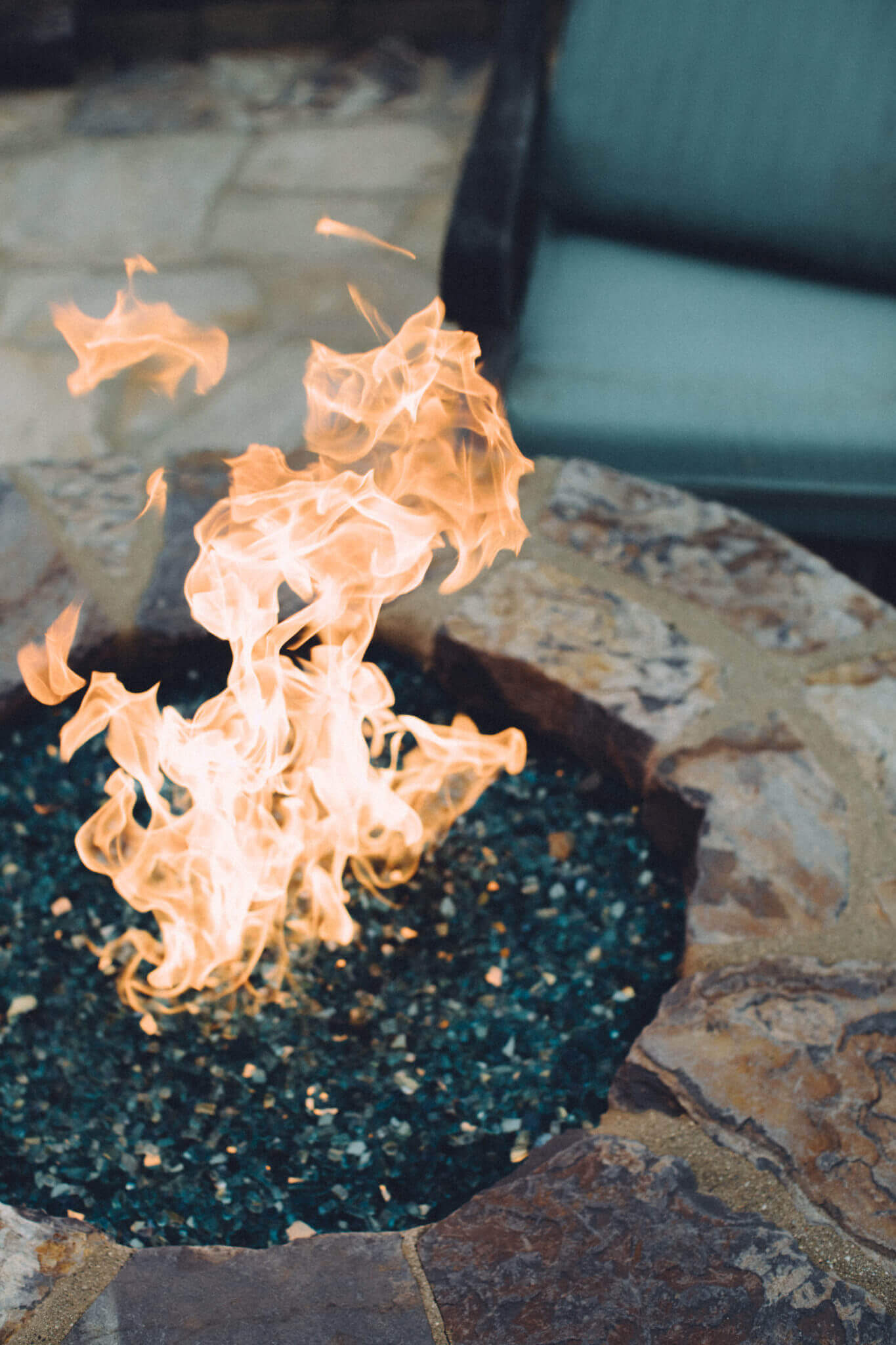 image of fire glass pebbles in a burning fire pit